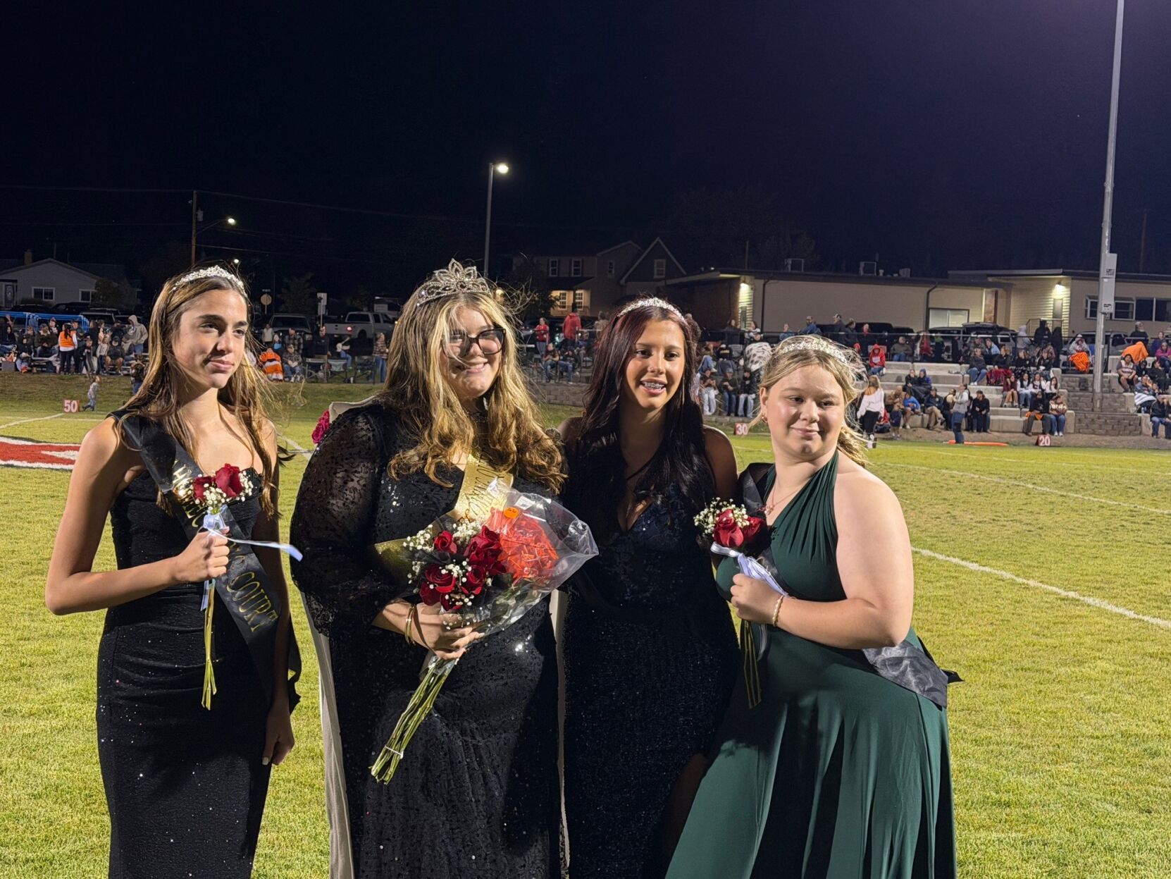 Dufur homecoming court from left to right: Lily Egeland - freshman, Gabriella Clark - senior, Piper Murders - junior, and Madeline Harvey - sophomore